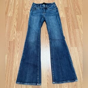 Buckle Black Boot Stretch Jean